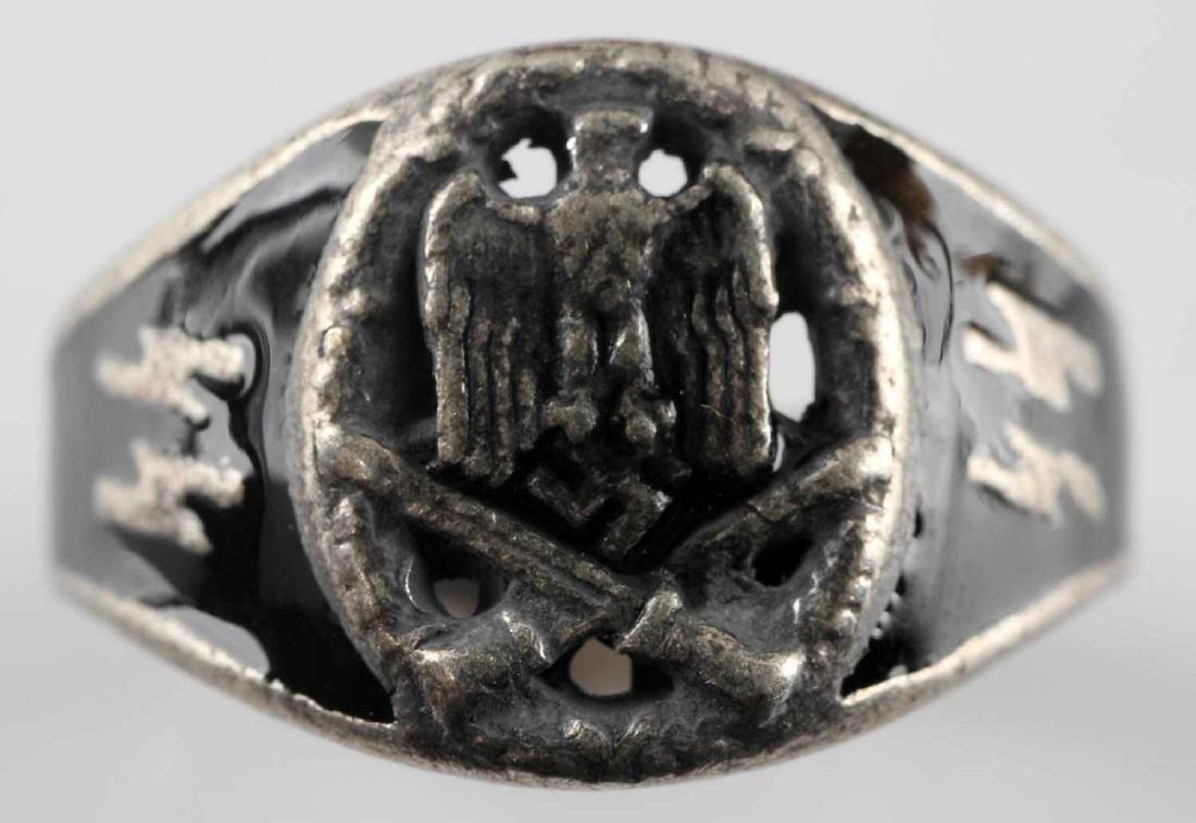 WWII GERMAN THIRD REICH SS GENERAL ASSAULT RING: Ring with the image of a General Assault Badge flanked by a pair of SS runes. Weighs 6.9 grams. Has 800 silver mark. In very good condition. Unauthenticated/Sold 'as is' This lot has a reserve.