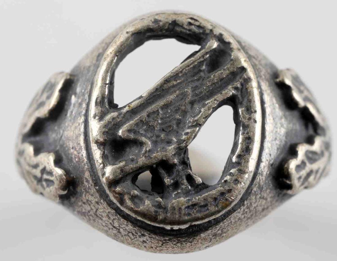 WWII GERMAN THIRD REICH LUFTWAFFE PARATROOPER RING: Silver ring with the badge of a Luftwaffe Fallschirmjaeger on the front. Weighs 6 grams. Has 800 silver mark. In very good condition. Unauthenticated/Sold 'as is' This lot has a reserve.