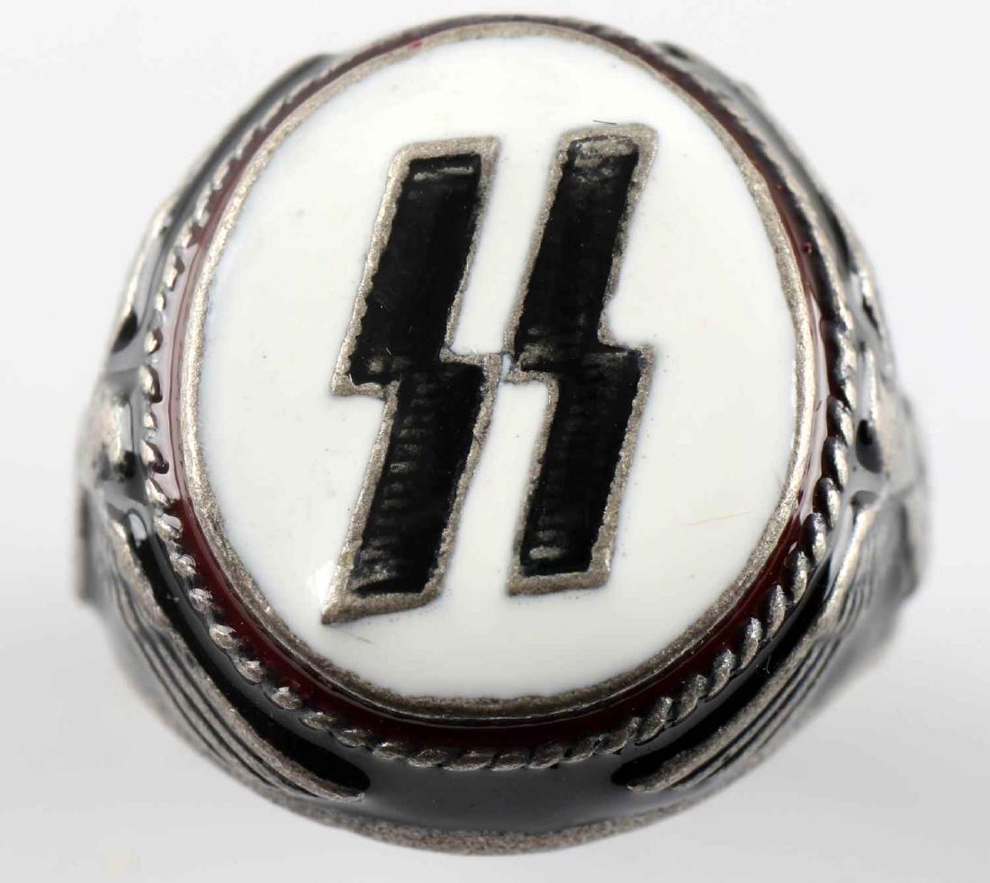WWII GERMAN THIRD REICH WAFFEN SS SILVER RING: Silver ring with a pair of SS runes flanked by two Reichsadlers. Weighs 12.6 grams. Has 800 silver mark. In very good condition. Unauthenticated/Sold 'as is' This lot has a reserve.