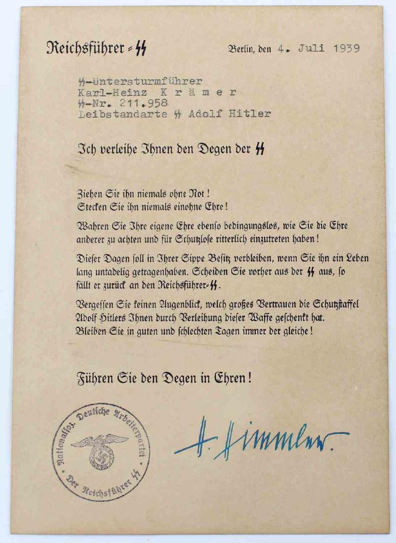 WWII GERMAN THIRD REICH SS DAGGER AWARD CITATION: German SS dagger award citation. Made to SS-Untersturmfuhrer Karl Heinz Kramer of SS Leibstandarte Adolf Hitler. Facsimile signed by Heinrich Himmler and NSDAP stamped. Excellent condition. Unauthenti