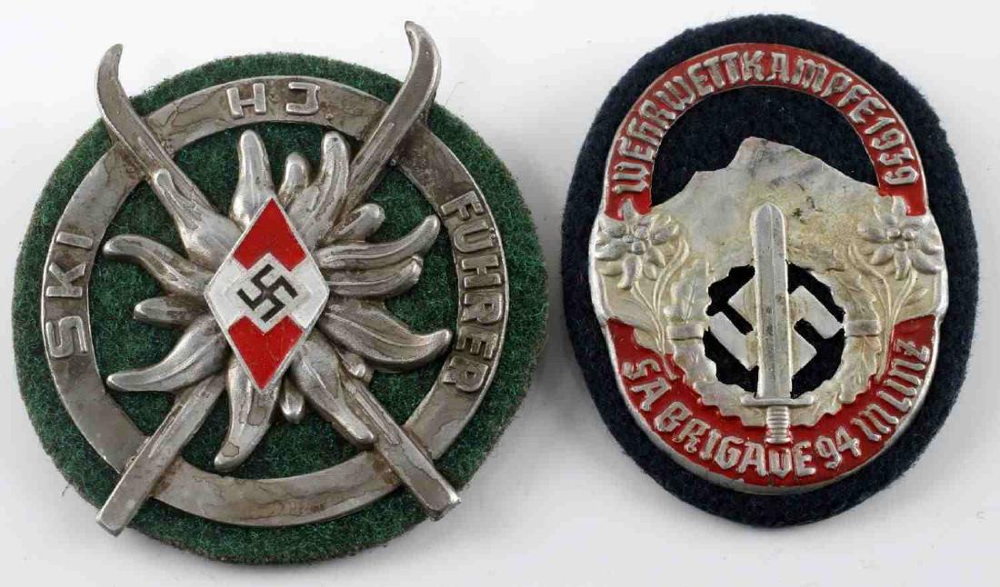 WWII GERMAN THIRD REICH MOUNTAIN TROOP BADGE LOT: Lot contains two German mountaineer badges. One is a Hitler Youth ski leader badge, while the other is for an SA mountaineer. Both are in very good condition. Unauthenticated/Sold 'as is' This lot has