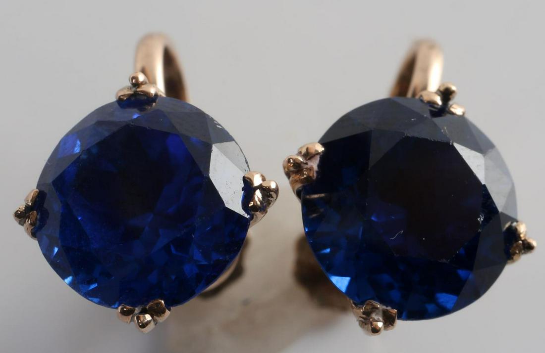 NATURAL BLUE SPINEL 14K GOLD SCREWBACK EARRINGS: Vintage estate natural blue spinel 14k gold screwback earrings. Round spinel stones measure approximately 9.5 mm by 6.5 mm. Slightly included. Excellent and vivid color. 6.7 TCW. Total weight is 3.7 g