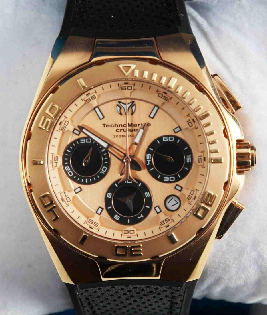 TECHNOMARINE TM 115346 MENS CHRONOGRAPH WATCH: Technomarine TM-115346 Men's watch. Features date/chronograph with rose gold & black face. Quartz movement. Case measures 45mm in diameter. Stainless steel with silicone band. Very good, near new cond