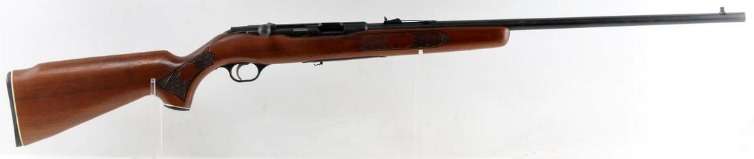 O.F. MOSSBERG 640KC BOLT ACTION RIFLE .22 MAG WMR: Blued steel with much oxidation, maker marked to left side of 24.5 inch barrel, bore is good and clear but needs cleaning, checkered wood stock, fixed front and rear sights, and wooden butt. Magazine 