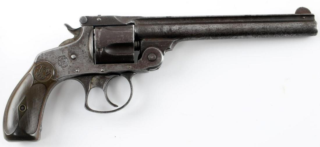 SMITH AND WESSON 38 MODEL 4 DOUBLE ACTION REVOLVER: Smith and Wesson .38 model 4 revolver. Made in Springfield. Patent year 1889. Top break with a 6" barrel and a 5 round cylinder. Good conditon for its age. Some pitting, patina, and small sections of