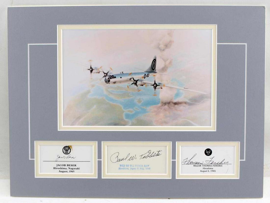 WWII ENOLA GAY THREE CREW MEMBER SIGNATURE LOT: Lot contains a print art image of the Enola Gay in flight with Hiroshima in the background. With that image and matted with it are three cards each bearing the signature of an Enola Gay crewmember. Th