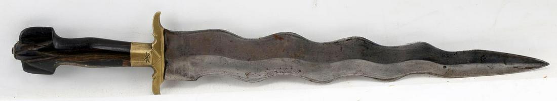 CONTEMPORY PHILIPPINE MORO KRIS WAVE BLADED DAGGER: Moro kris form dagger with "Philippines" etched into the blade. Measures about 22.5 inches in length. In very good condition. No scabbard. This lot has a reserve.