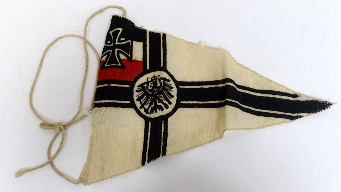 IMPERIAL GERMAN KAISERLICHE MARINE PENNANT FLAG: Pennant flag of the Imperial German Navy. Flag appears to be based on the early 20th century design of the war ensign used during WWI. Flag measures 10x6.5 inches. In very good condition. This lot has