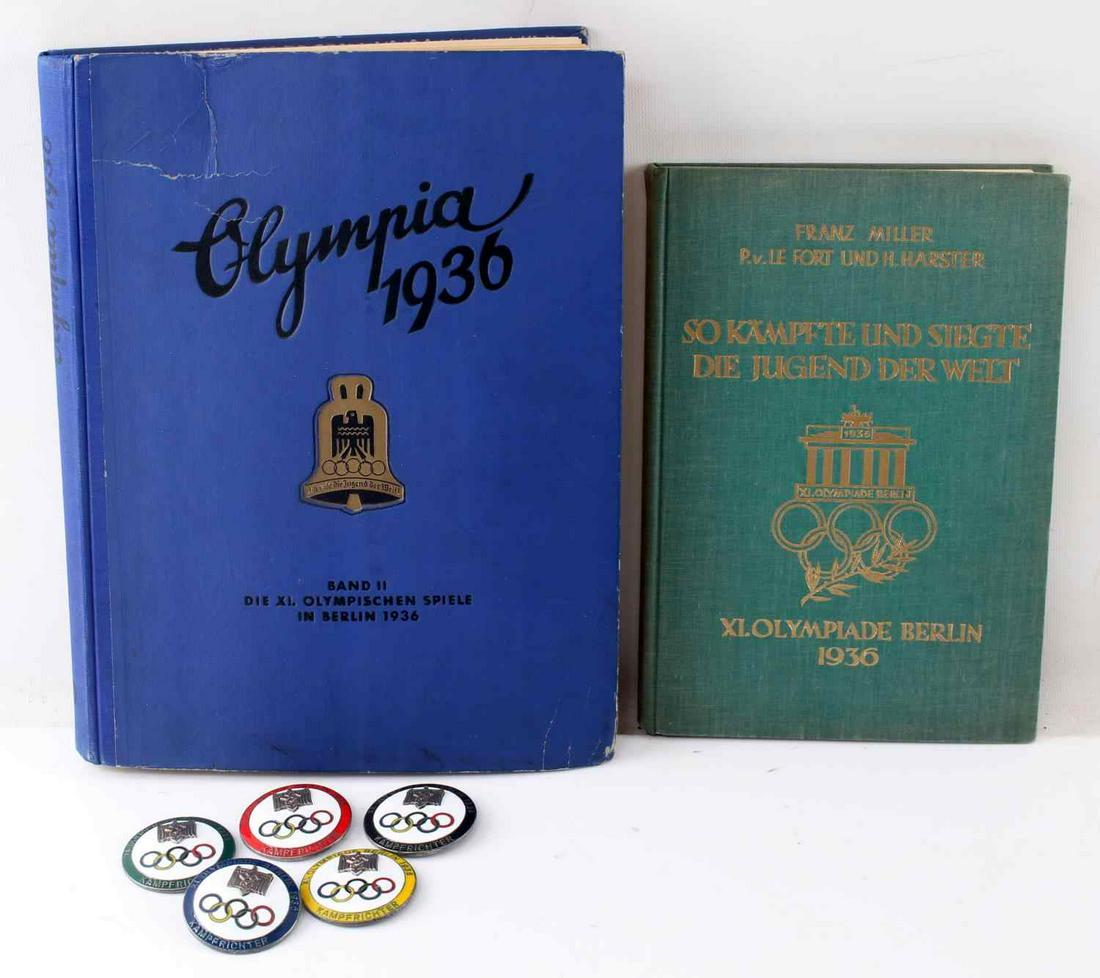 WWII GERMAN 1936 OLYMPIC GAMES BOOK & BADGE LOT: This lot includes 1 German Olympia 1936 cigarette card album, 1 Franz Miller "So Kampfte und Siegte Die Jugend Der Welt." Olympia 1936 Berlin book by Franz Miller, and 5 1936 Olympic Games badges. Cig