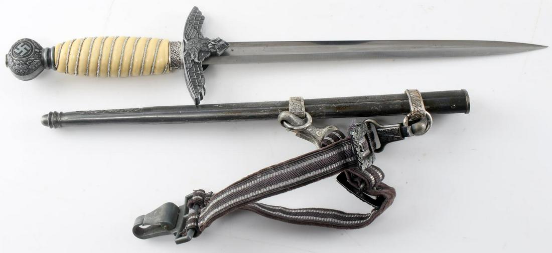 WWII GERMAN THIRD REICH 2ND MODEL LUFTWAFFE DAGGER: German 2nd model Luftwaffe dagger by Herder. Silver wire wrapped cream handle with excellent correct hanger and pebbled scabbard. Some abrasions to scabbard but very good overall. Blade is excellent. 