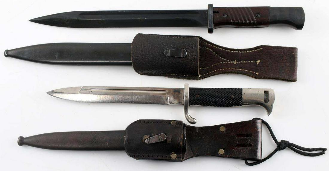 WWII GERMAN THIRD REICH MAUSER BAYONET LOT OF 2: This lot includes 2 German bayonets. 1 is a field bayonet by Durkopp and is numbered "5033." Its scabbard is also marked Durkopp but is numbered 3866. Scabbard and bayonet are both also Waffenamt mark