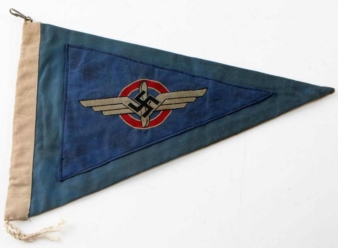 WWII GERMAN THIRD REICH DLV NSFK PENNANT FLAG: German DLV-NSFK pennant. Double sided with 1 side having a machine embroidered DLV insignia on multi blue panels. Reverse side has separately applied machine embroidered NSFK winged man logo on white 