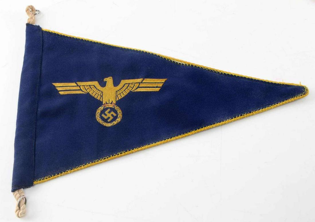 WWII GERMAN 3RD REICH KRIEGSMARINE VEHICLE PENNANT: German WWII Kriegsmarine automobile fender pennant. Double sided with golden yellow Reichsadler and golden yellow piping. Shows some age and fading but is very good overall. This lot has a reserve.