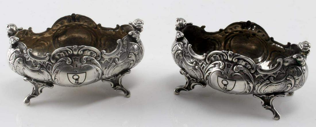 WWII GERMAN THIRD REICH GORING SALT CELLAR LOT: Lot contains two salt cellars which are believed to be silver plate and have the crest of Hermann Goring etched on the front. Each measures 3.25x1.75x1.75 inches In very good condition. Unauthenticate