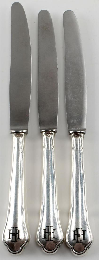 WWII GERMAN THIRD REICH SILVER HIMMLER KNIFE LOT: Lot contains three silver knifes with the cypher of Heinrich Himmler engraved on the handle. Each knife is marked "Rostfrei" on the blade and "900" on the handle. In very good condition overall. This 