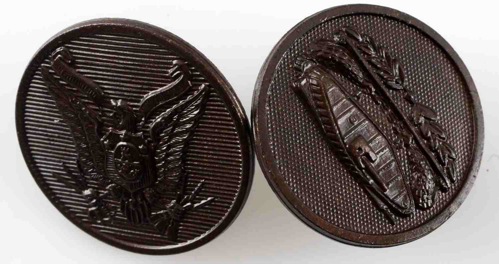 US ARMY AEF CONSTABULARY TANK CORPS COLLAR DISCS: Two WWI EM collar discs: one Philippine Constabulary and one Armored Tank Corps. Measure 1 inch in diameter. Bronze construction. For an enlisted man. N.S. Meyer, Inc. New York marked to each. Unauthe