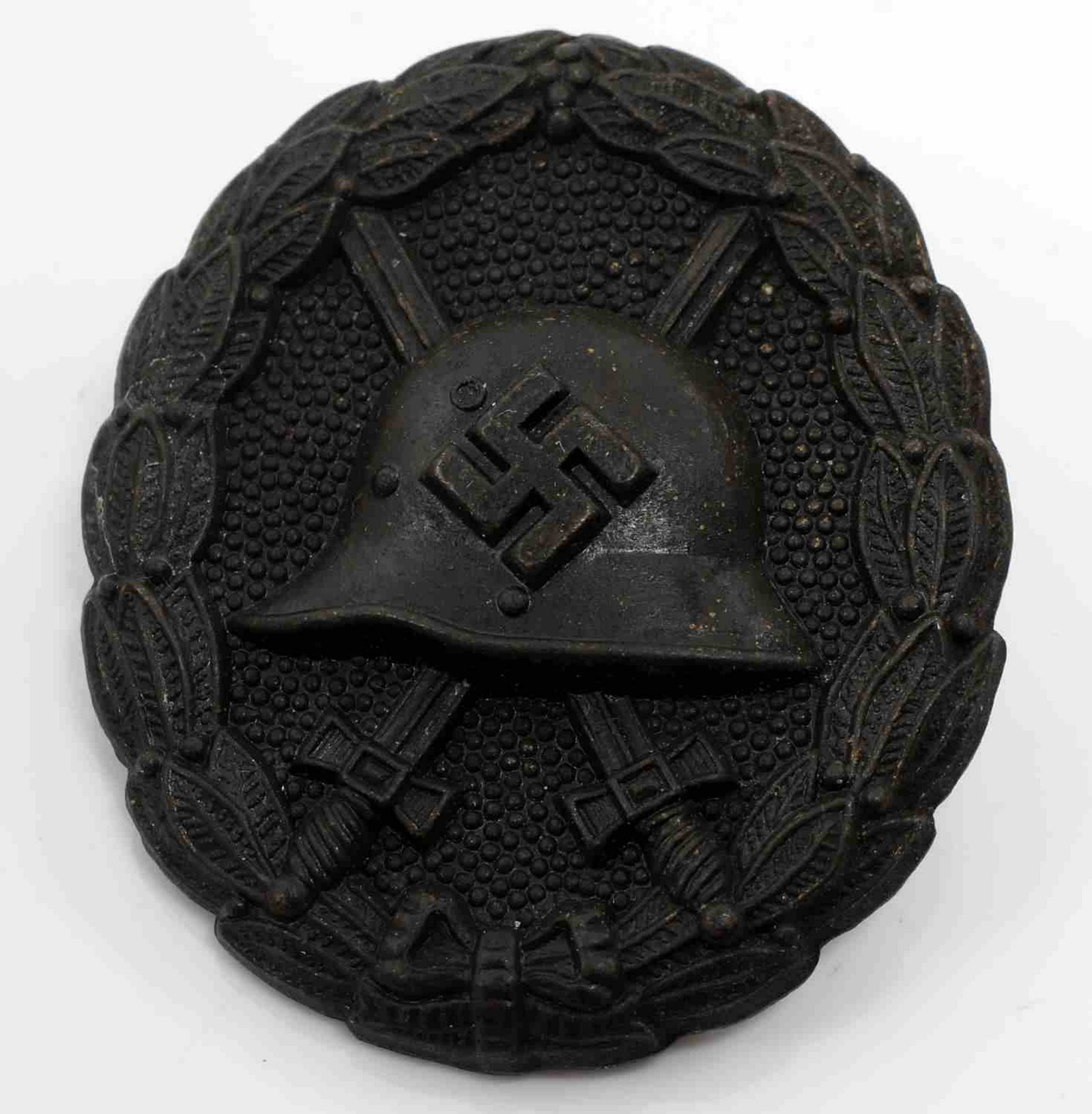 WWII GERMAN CONDOR LEGION WOUND BADGE BLACK: German Condor Legion wound badge. Stamped construction with screw back mount post. Black version; awarded for 1-2 wounds in combat during the Spanish Civil War. Excellent condition with some minor dis