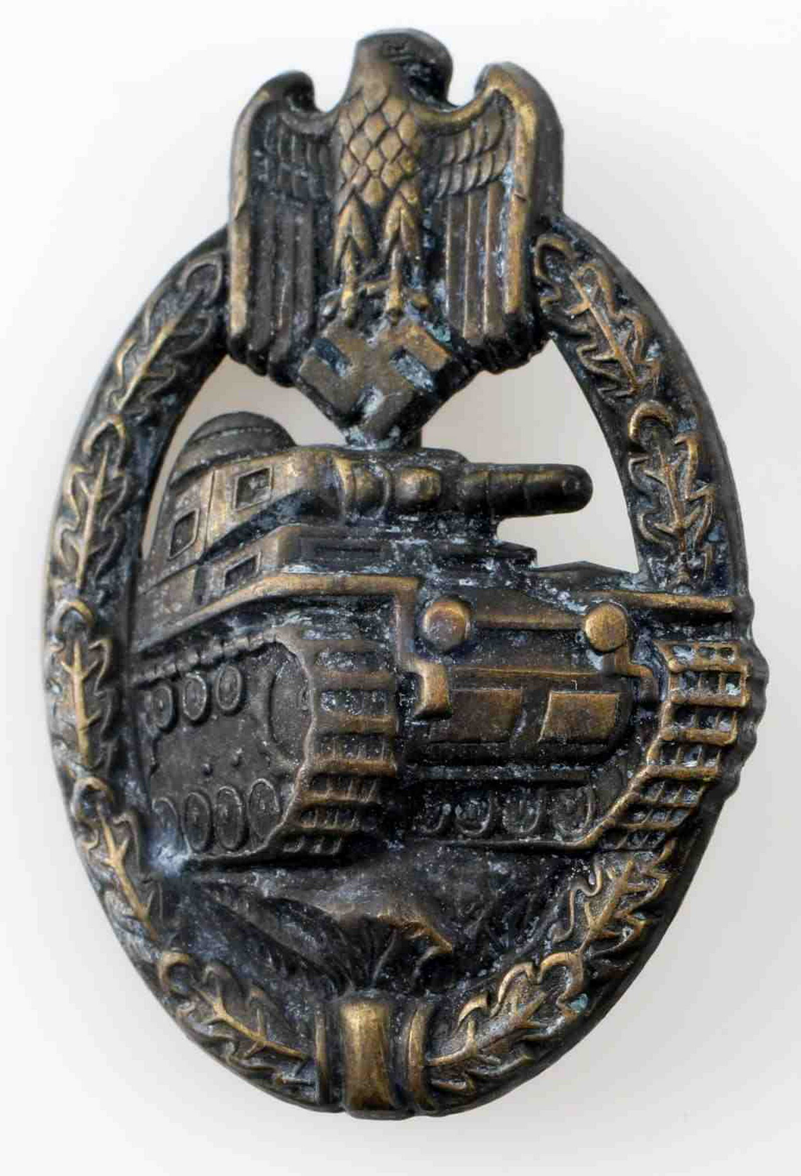 WWII GERMAN 3RD REICH BRONZE PANZER ASSAULT BADGE: Bronze edition of the Panzer Assault Badge. Has a thin vertical pin back. Stamped bronze construction. In very good condition. Unauthenticated/Sold 'as is'.