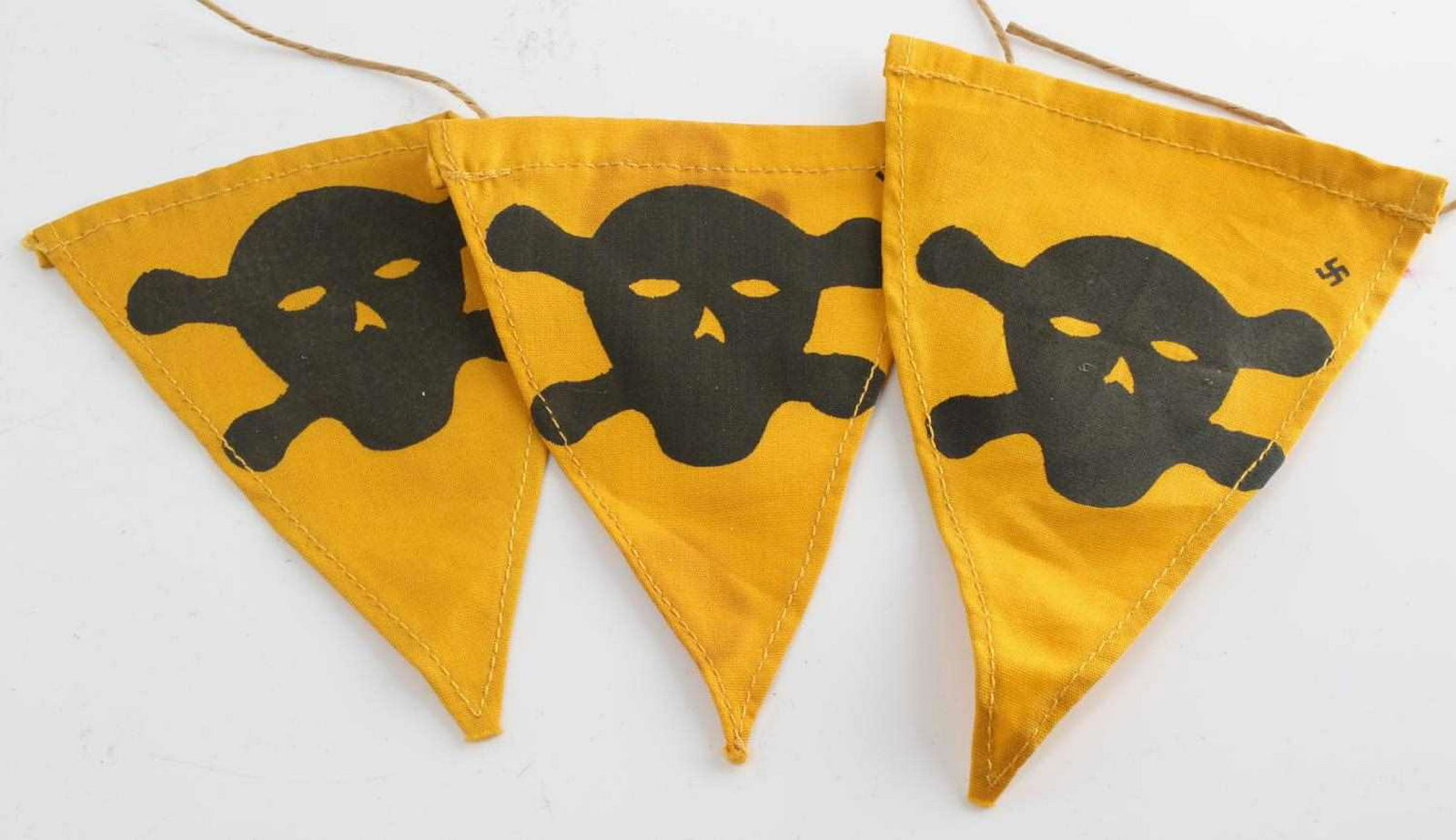 WWII GERMAN MINE IDENTIFICATION FLAG ID LOT OF 3: Lot contains three German WWII Mine Identification skull & crossbone flags. They measures approximately 3 3/8 inches wide by 4 3/8 inches long. Each shows a skull and crossbones and has a string in th