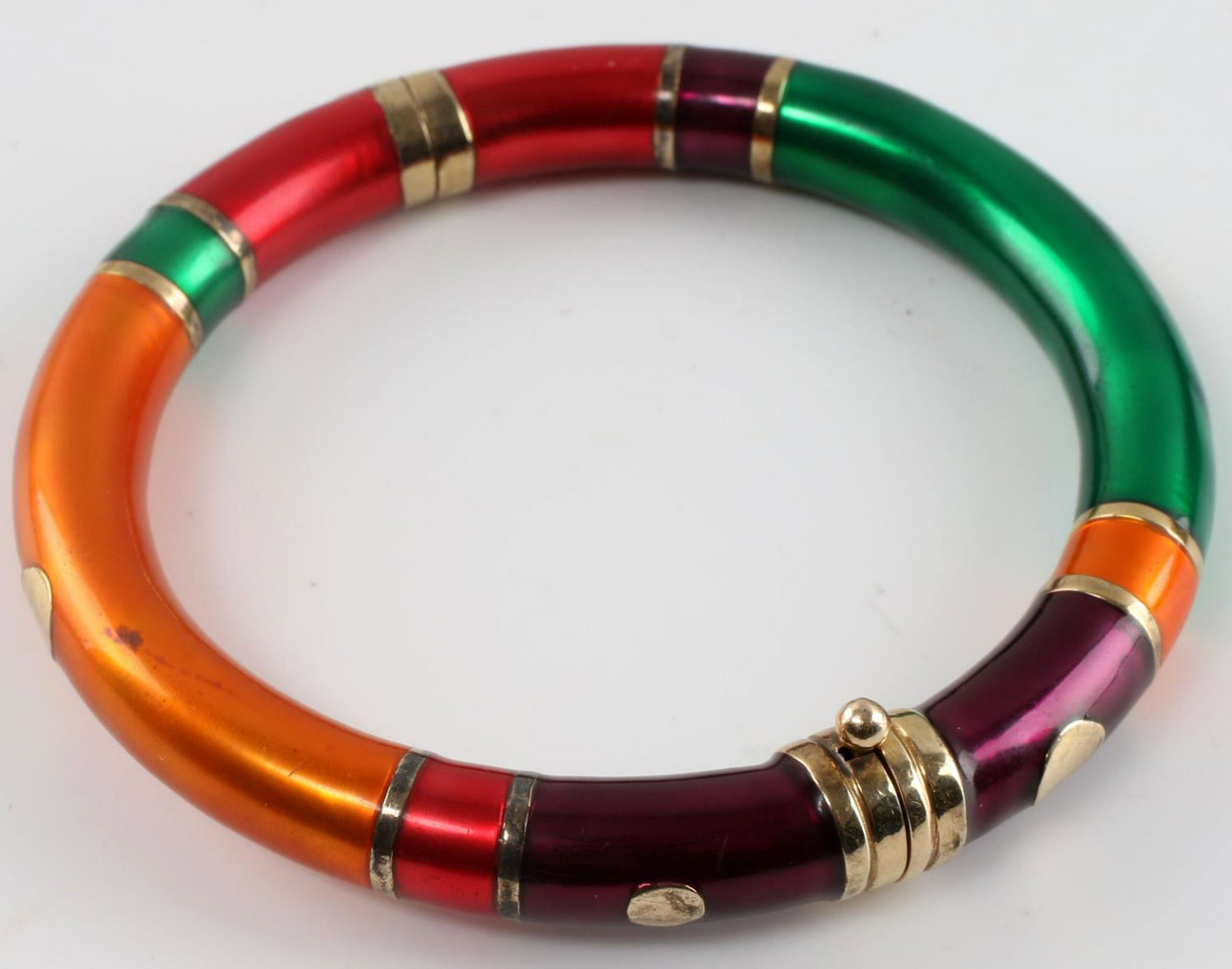 14K GOLD STERLING SILVER CLOISONNE ENAMEL BRACELET: Bracelet with brightly colored cloisonne enamel in green, orange, purple and red laid over sterling silver. 14k gold decoration in areas.