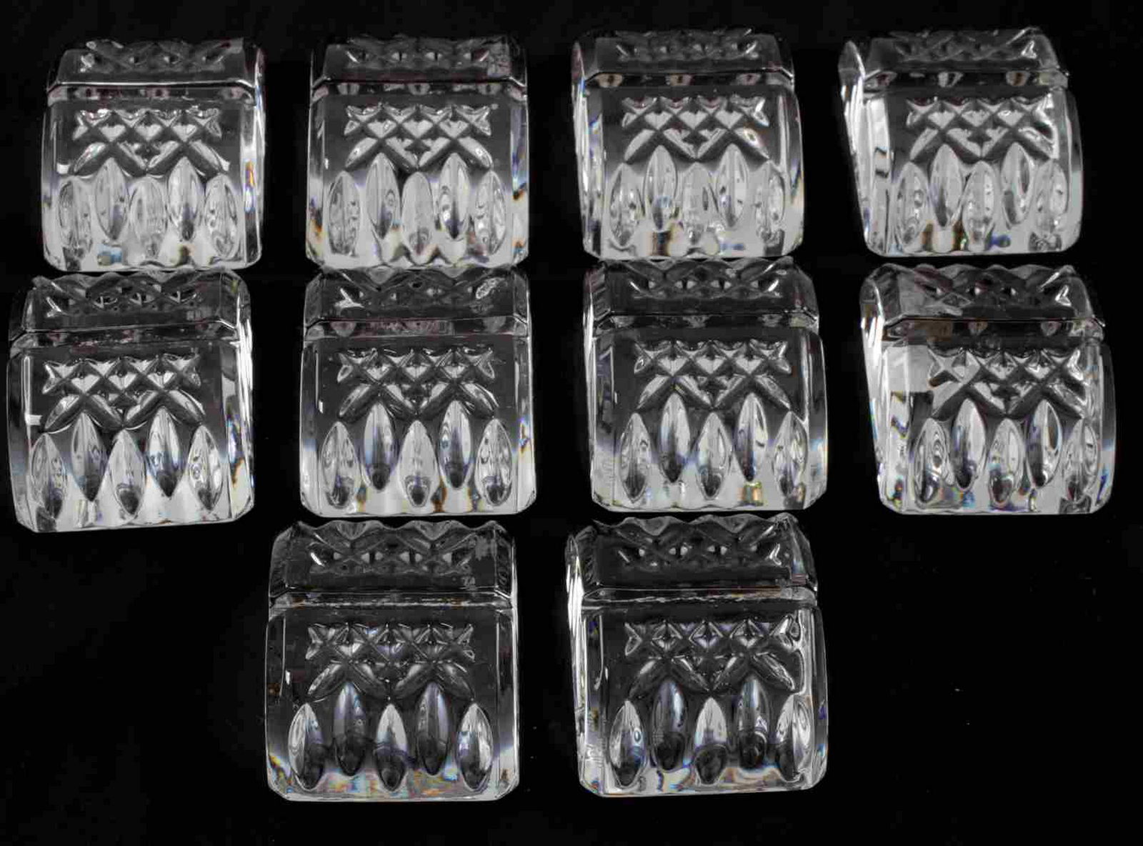WATERFORD CRYSTAL LISMORE PLACECARD HOLDERS: 10 signed Waterford Crystal "Lismore" pattern placecard holders. Each measures 2.25 inches by 1.75 inches. All are in good condition.