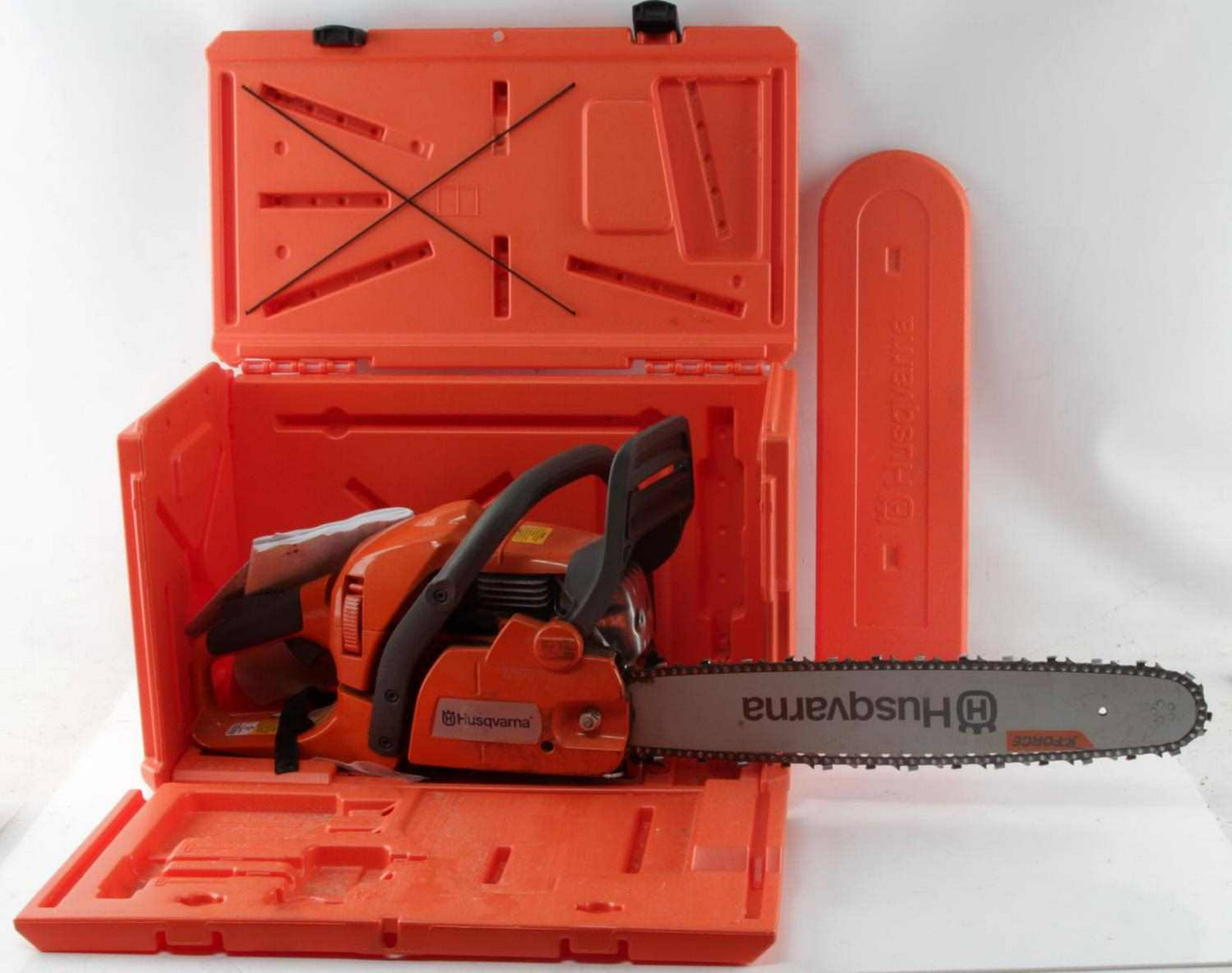 20 INCH HUSQVARNA GAS CHAINSAW 450 E SERIES: Used. In good working condition. 20-inch blade. With blade guard and storage case. Item is large and heavy. Instruction manual included. Local pick-up only.