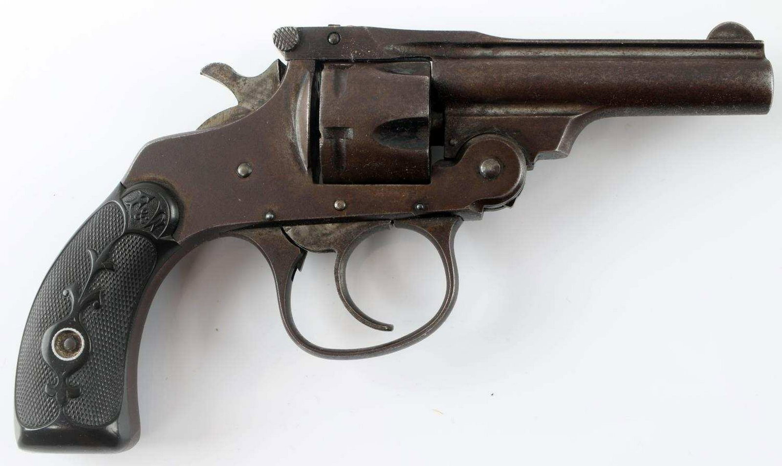 FOREHAND MODEL 1901 TOP BREAK 5 SHOT REVOLVER .32: Brown patina, maker and model marked to top rib, 3 inch barrel with fair pitted bore, F&W bakelite grips, serial no. marked to butt, and half moon front sight. Double action works. Fair condition. Req