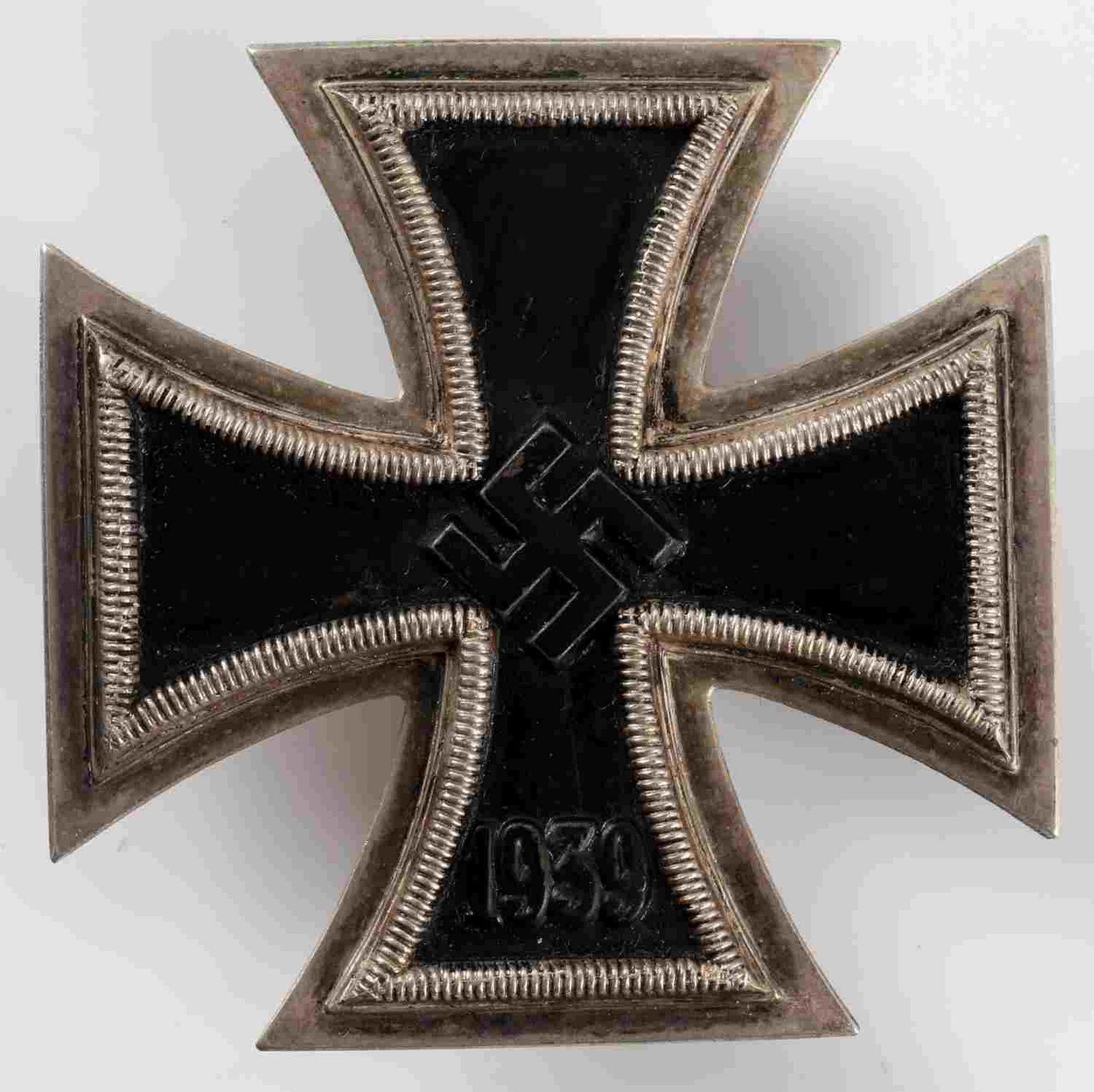WWII GERMAN THIRD REICH IRON CROSS FIRST CLASS: Iron Cross First Class medal. Black painted magnetic iron core with a non-silver frame. No maker mark or other markings. Mild paint wear on the core. In good condition. Unauthenticated/Sold 'as is'