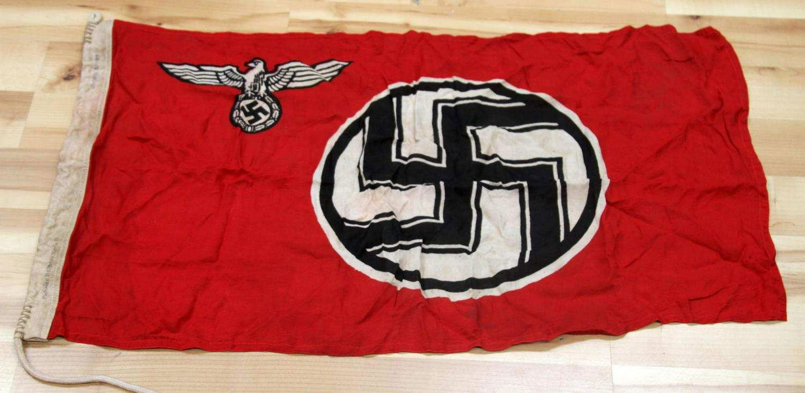 WWII GERMAN THIRD REICH STATE SERVICE FLAG: German State Service Flag. Measures 37x21 inches. Has stamped on the hoist 'Fahner Richter Koln 8'. The stitching fluoresces under blacklight. In very good condition. Unauthenticated/Sold 'as is'