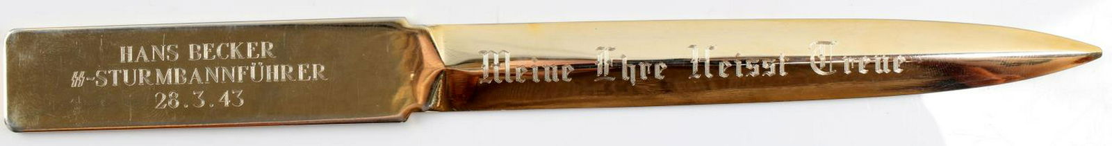 WWII GERMAN THIRD REICH BRASS SS LETTER OPENER: Brass SS letter opener. Handle reads "Hans Becker SS-Sturmbannfuhrer 28.3.43" on one side and has Himmler's signature on the other. The blade has "Meine Ehre Heisst Treue" on one side and "Treue Um Tr