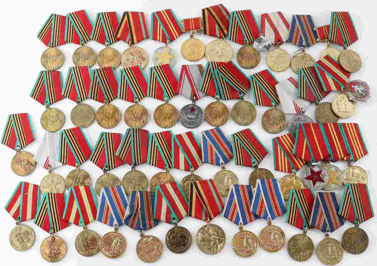 SOVIET UNION USSR MEDAL ASSORTED LOT OF 50: Lot contains 50 Soviet medals of assorted types and design. All or almost all appear to have their associated ribbon affixed. In very good condition. This lot has a reserve.