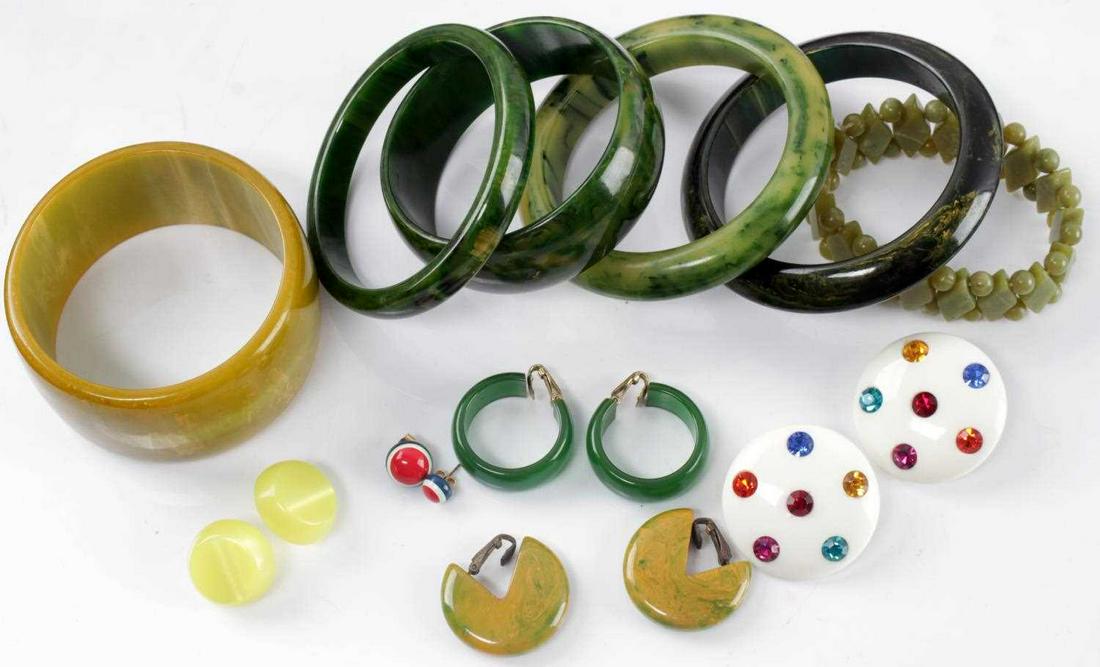 MID CENTURY JEWELRY BAKELITE BRACELETS & OTHERS: Five American bakelite bracelets in tone of green and yellow. One green stone beaded stretch bracelet. One pair of white circular earrings with colored rhinestones. Pair of green resin hoop earrings. 