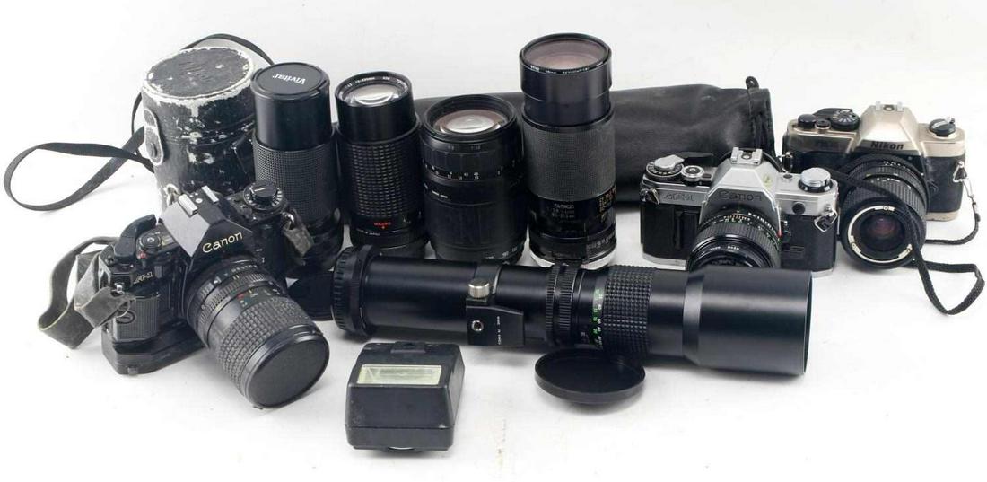 LOT OF CANON NIKON CAMERAS & LENSES FLASH: One Canon FM10 camera. One Canon A-1 camera. One Canon AE-1 camera. One Canon Speedlite 155A. One Vivitar 70-210 MM lens. One Tamron Adaptall 2 for Canon lens. One Tou/Five Star lens. One Tamron 70-30