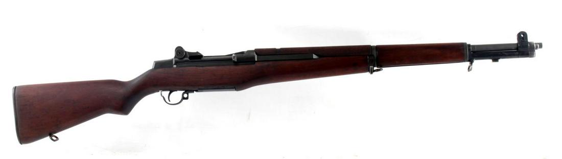 WWII US ARMY SPRINGFIELD M1 GARAND SEMI AUTO RIFLE: US M1 Garand manufactured by the Springfield arsenal. Stock has Springfield proof "P" cartouche. Has cleaning and maintenance tools under the buttplate. Some wear on the finish of the gas tube near th