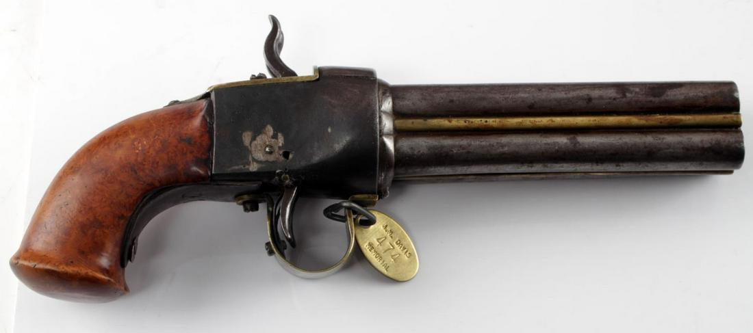 ANTIQUE 4 BARREL PEPPERBOX PERCUSSION PISTOL: Antique 4 barrel pepperbox percussion pistol with hand-twisted barrel assembly. All four barrels can be rotated 180° to present the second set to the hammers. Previously owned by the J.M. Davis Arms