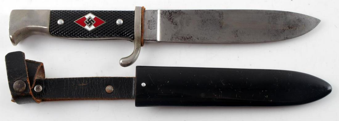 POST WWII GERMAN HITLER YOUTH KNIFE DAGGER: Post war Pic, Solingen made Hitler youth knife. In very good condition with scabbard and leather frog. Maker marked "PIC, Solingen Germany" on ricasso. This lot has a reserve.
