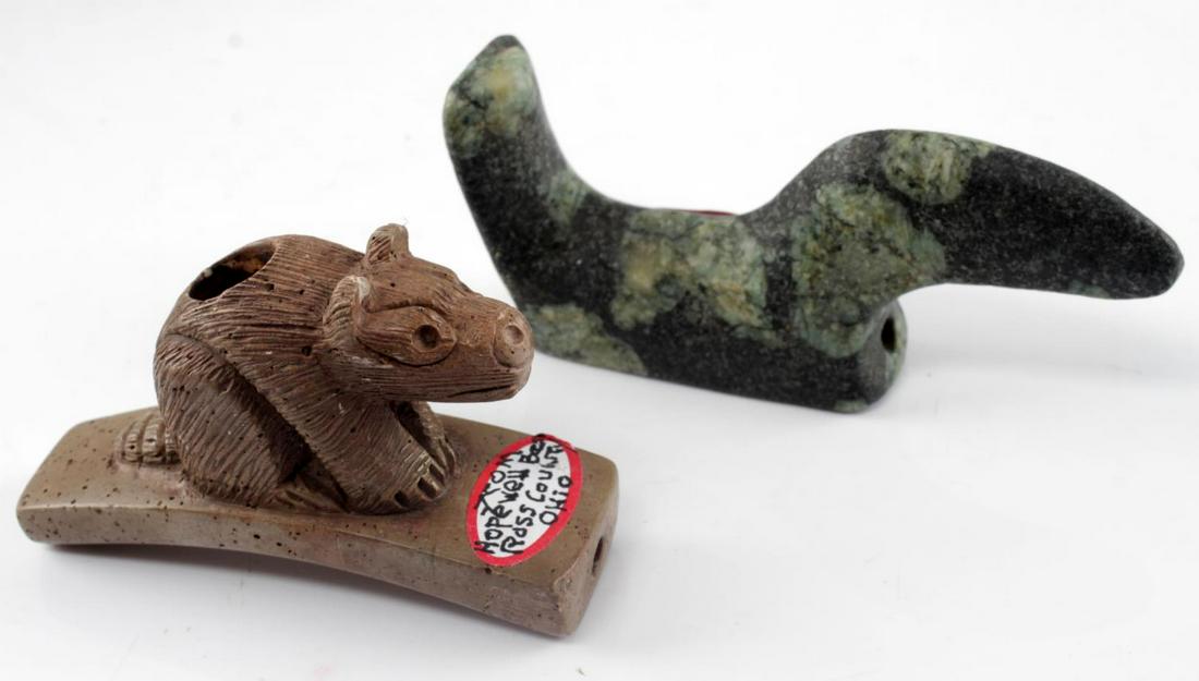 LOT OF 2 ARTIFACTS BIRD STONE AND RACCOON PIPE: Bird effigy is made from green blue spotted stone, measures 4 inches long, from Lee county, Iowa. The raccoon pipe is made from brown stone and measures 3 inches long, from Ross county, Ohio, little c