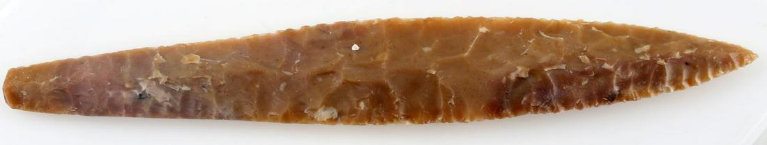 LARGE NEBO HILL STYLE ARROWHEAD POINT BROWN: Large point made from a creamy brown chert, wider at middle, tapers down to flat base, broad flaking, deep lighter inclusions, sharp edges to touch, measures 11 inches long. Very good condition.