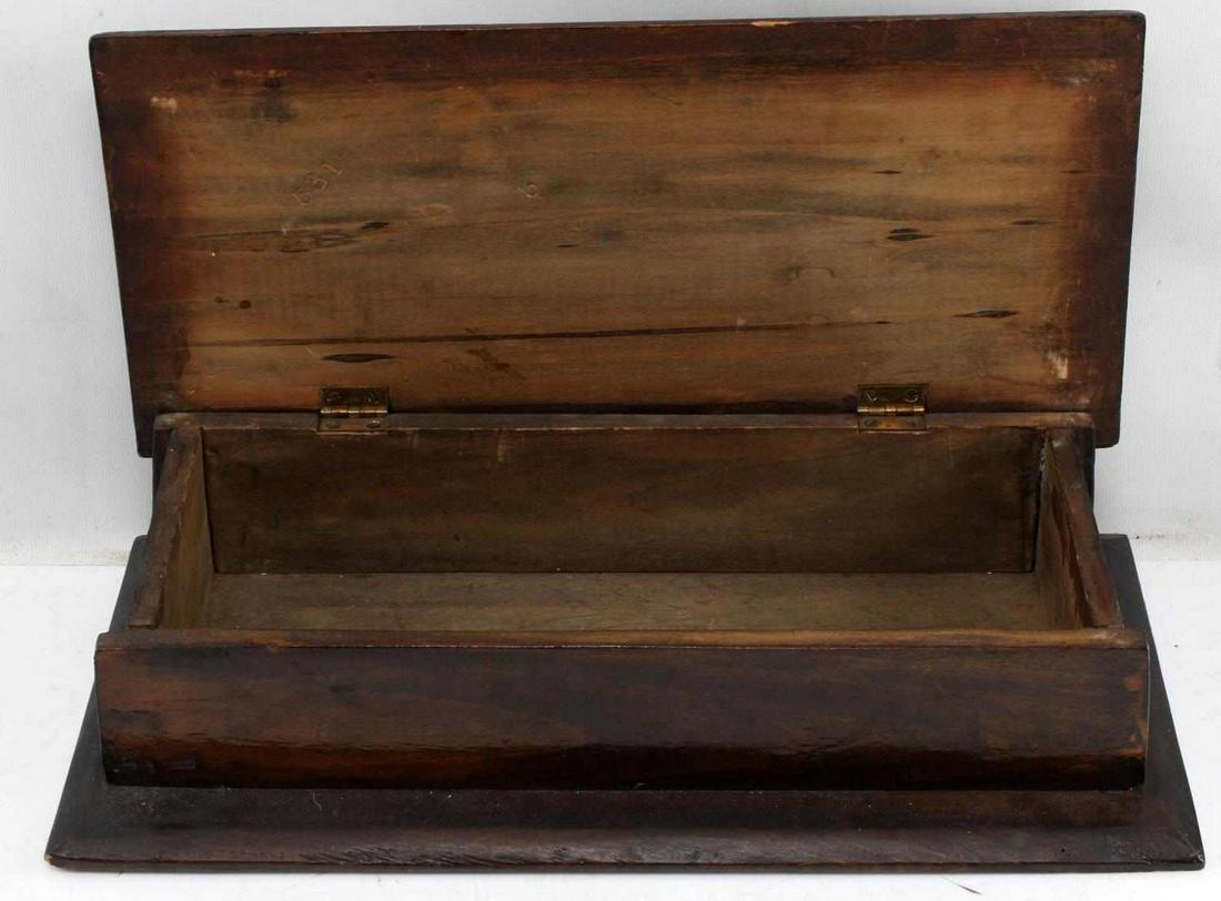 FOLK ART PAINTED HAND MADE WOODEN BOX: Painted folk art wooden box. Measures 16.25x3.75x7.5 inches at largest points. Dark laquer with red and green decoration on the lid. Has "5319" stamped into the underside of the box and lid. In very g