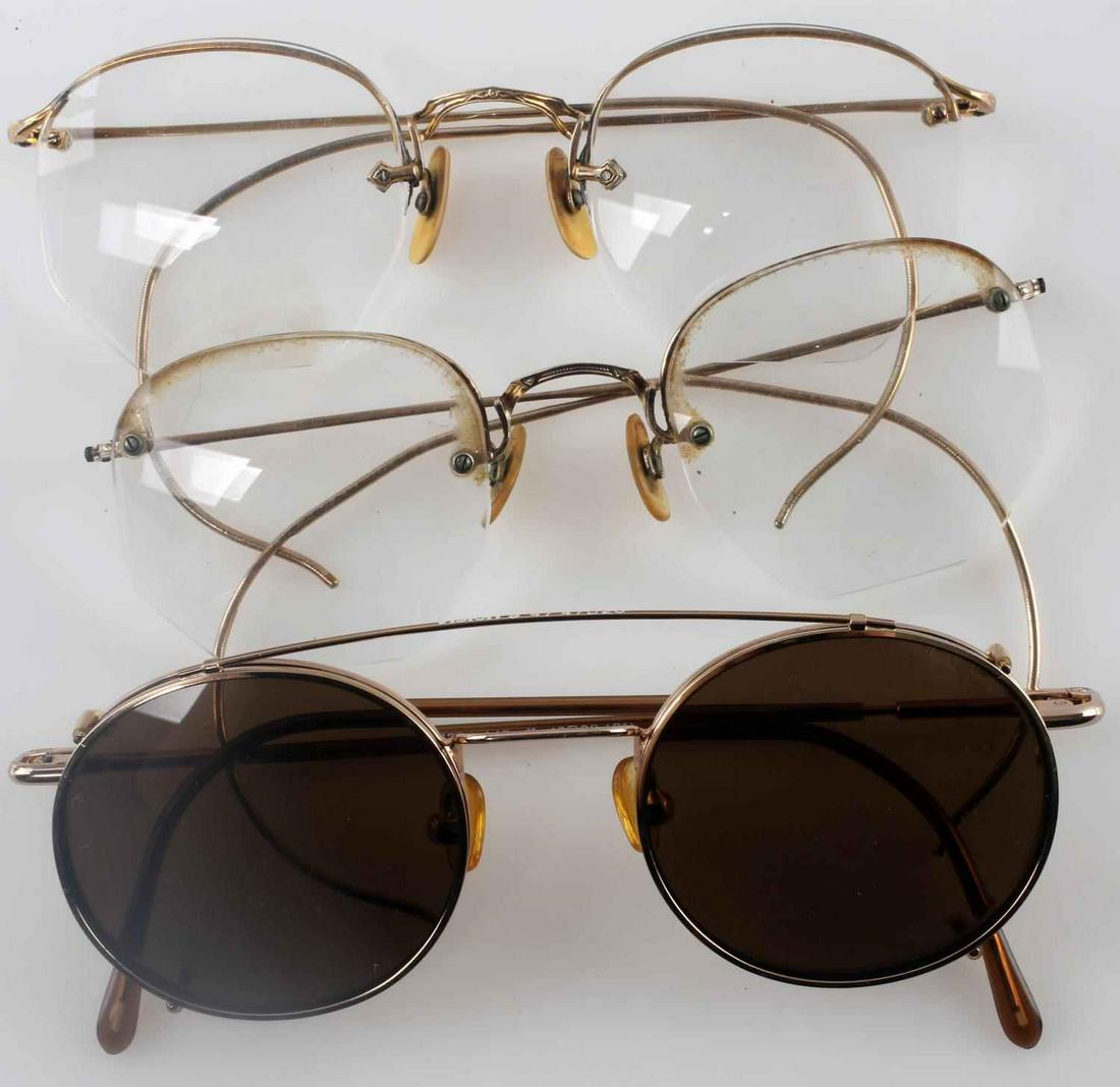 3 PAIR OF GOLD FILLED ANTIQUE SPECTACLES EYEGLASS: Vintage and antique wire rimmed glasses, with prescription lenses still intact, one has a sunglass attachment and a maker Visions, each very good original condition.