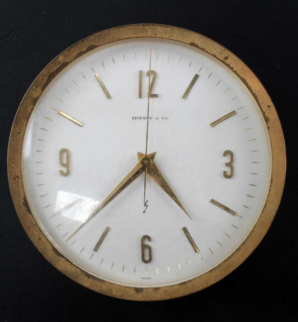 TIFFANY & CO. BRASS PRESENTATION DESK CLOCK: 1970 Hans A. Matthias Award from Ford 1970,, some finish loss and electric cord is cut so not working, measures 4 by 2 inches.
