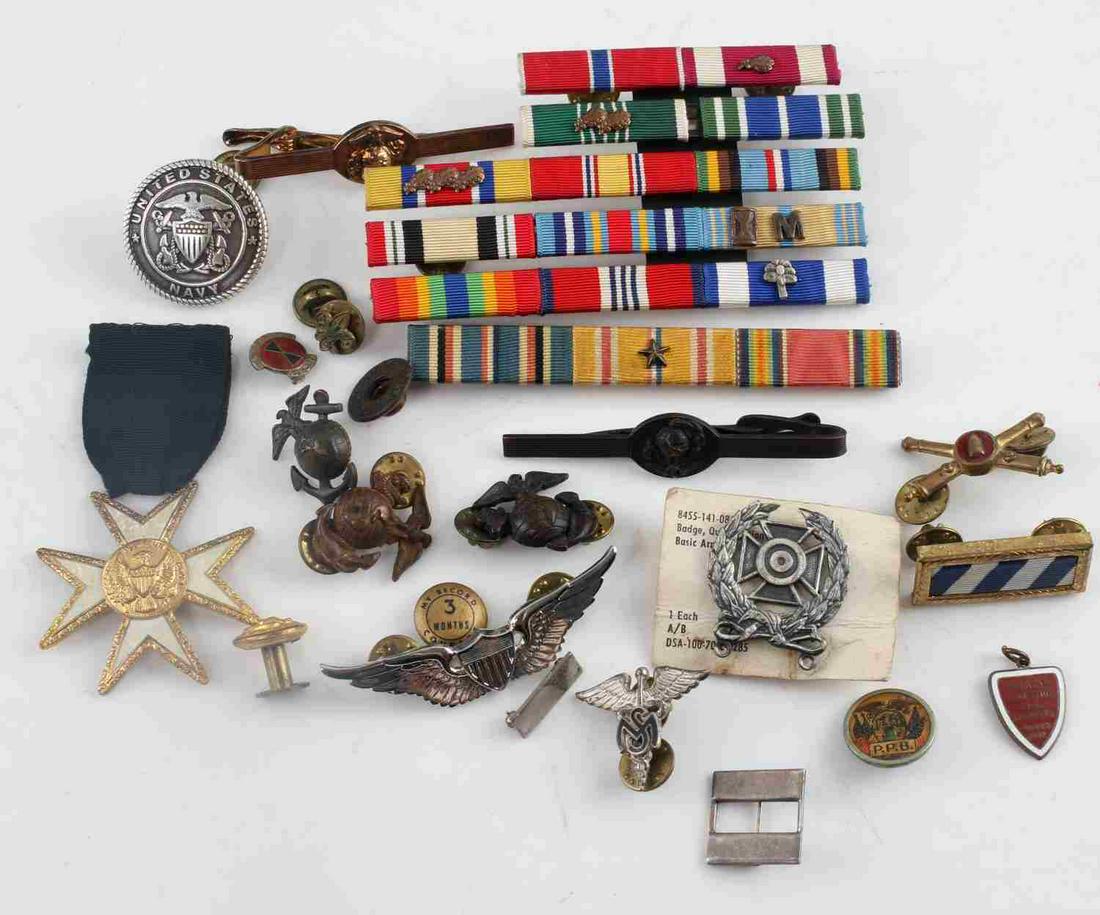 WWII & LATER US ARMY BADGE MEDAL & RIBBON BAR LOT: This lot includes a good variety of WWII and post WWII US badges, medals, and ribbon bars. Includes some Marine Corps and Air Force badges. Good condition overall. Some wear and signs of age present.