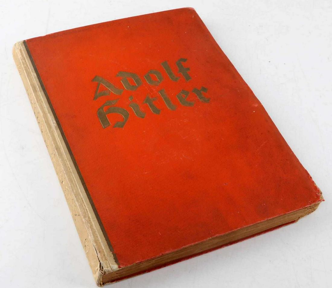 WWII GERMAN 3RD REICH ADOLF HITLER CIGARETTE BOOK: Large format illustrated book Adolf Hitler Pictures From the Life of the Fuhrer, (Herausgegeben vom Cigaretten/Bilderdienst: Hamburg), 1936, 136pp. folio, foreword by Hermann Goring. This is a "cigare