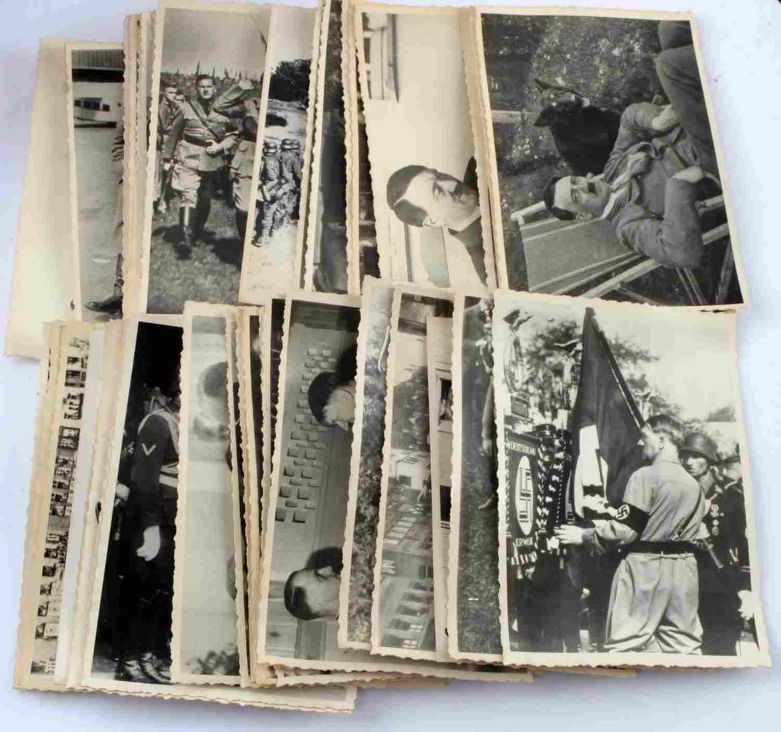 WWII GERMAN ADOLF HITLER PHOTOGRAPH LOT OF 44: WWII photographs of Adolf Hitler from the Ukrainian closed for public archives. 44 photographs included each with Ukrainian marks at their reverse. They measure 4 7/8 inches X 3 3/8 inches. Some foxin