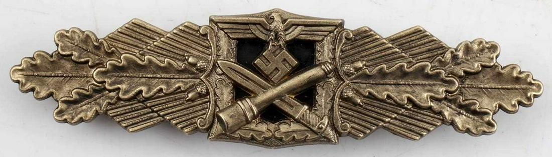 WWII GERMAN 3RD REICH CLOSE COMBAT CLASP IN BRONZE: Bronze German close combat clasp. Maker marked "FEC W.E. Peekhaus Berlin" with "FLL" within circles. Has a magnetic plate back piece with a wide horizontal pin back and a "c" catch. Awarded for 15 day