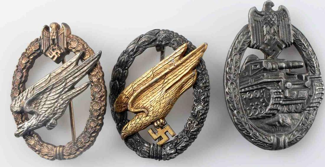 WWII GERMAN THIRD REICH HEER & LUFTWAFFE BADGE LOT: Lot contains three badges from the German Heer and Luftwaffe. Includes Panzer Assault Badge, Army Paratrooper, and Luftwaffe Paratrooper. In very good condition overall. Unauthenticated/Sold 'as is'