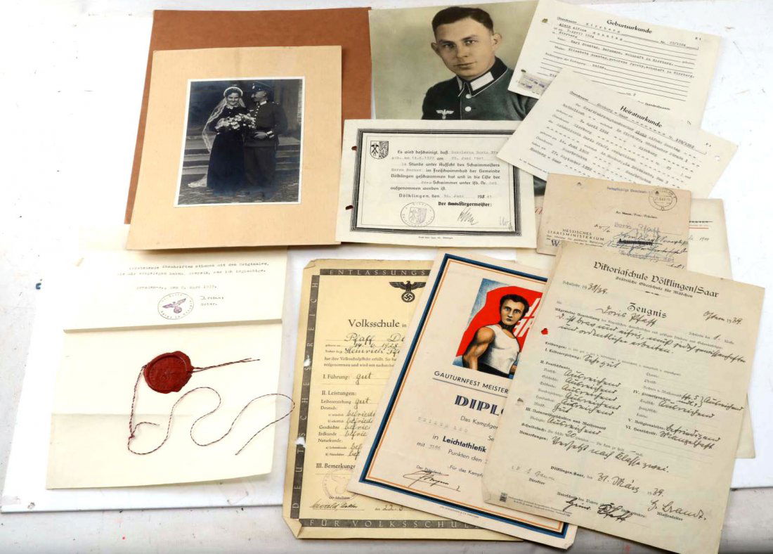 WWII GERMAN DOCUMENT & PHOTGRAPH LOT OF 9: German WWII era document and photograph lot. Includes Heer soldier wedding photograph, 1 colorized portrait of soldier, and a variety of mostly school related documents including diplomas. Many are na