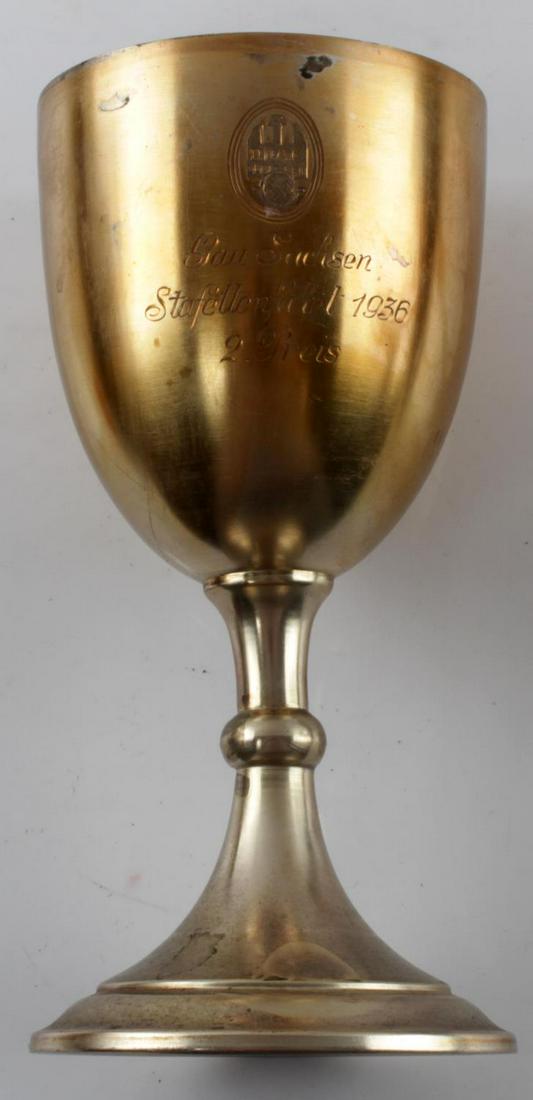 DDAC NATL SOCIALIST MOTOR CORPS CHALICE GERMAN: Given to members of the Third Reich who had remarkable achievements in the DDAC. Engraving to front, 'Gau Sachsen Stafettenfahrt 1936, 2 Preis'. Stands 7 inches tall. Tinted aluminum construction. Una