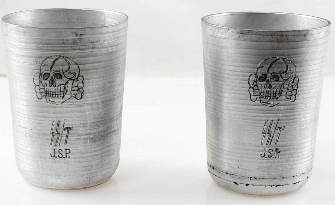 WWII GERMAN SET OF 2 WAFFEN SS ALUMINUM CUPS: Totenkopf SS/T J.S.P. etched to front of each cup, measure just under 3 inches tall. Very good condition. Unauthenticated, sold as is. This lot has a reserve.
