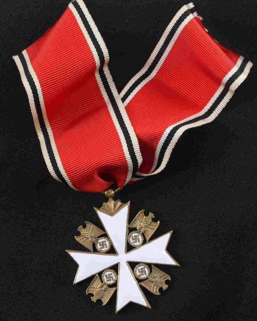 WWII GERMAN THIRD REICH EAGLE ORDER 4TH CLASS: Eagle Order 4th Class medal. Nice enamel with no faults. Includes original ribbon. Lightly stamped 20 above the pie attachment for the ring. In very good condition. This lot has a reserve.